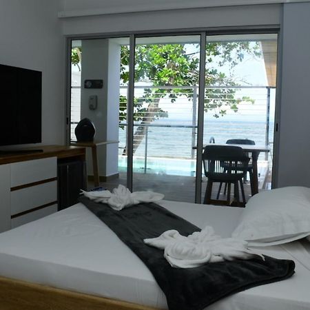 Alpha Hotel Boutique Necocli Bagian luar foto