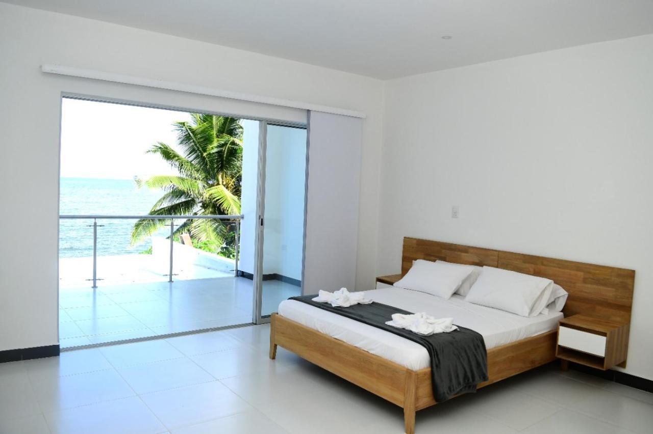 Alpha Hotel Boutique Necocli Bagian luar foto