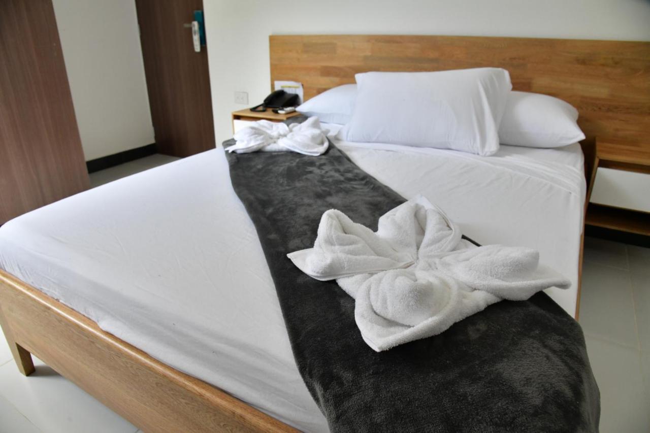 Alpha Hotel Boutique Necocli Bagian luar foto