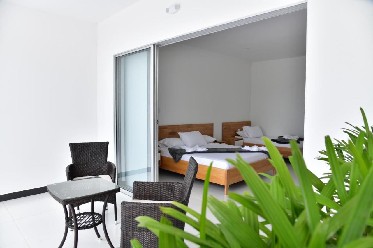 Alpha Hotel Boutique Necocli Bagian luar foto