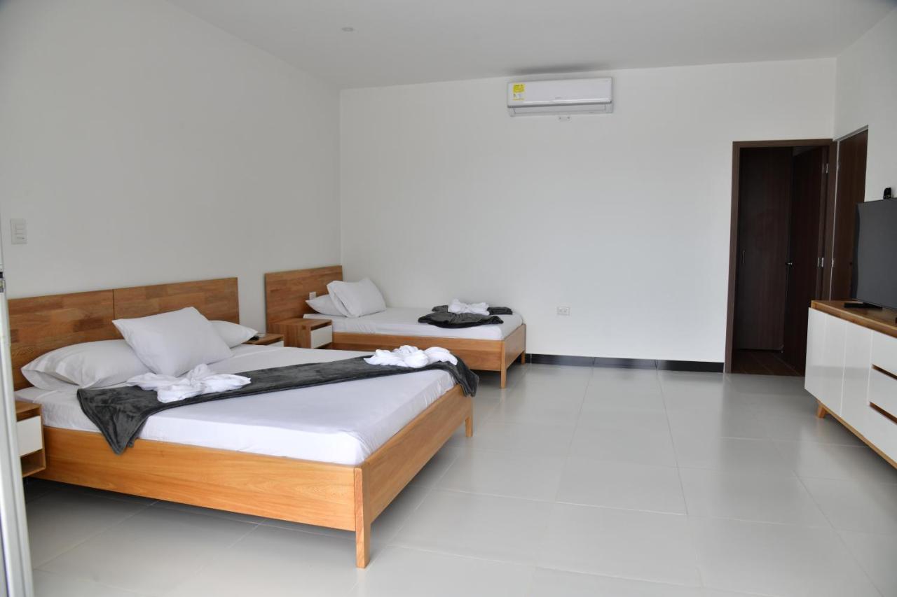 Alpha Hotel Boutique Necocli Bagian luar foto