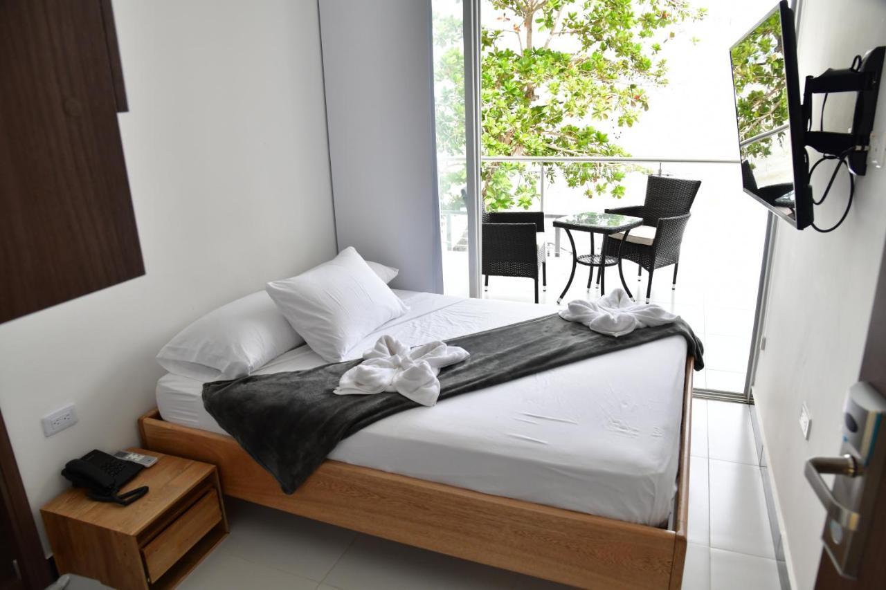 Alpha Hotel Boutique Necocli Bagian luar foto