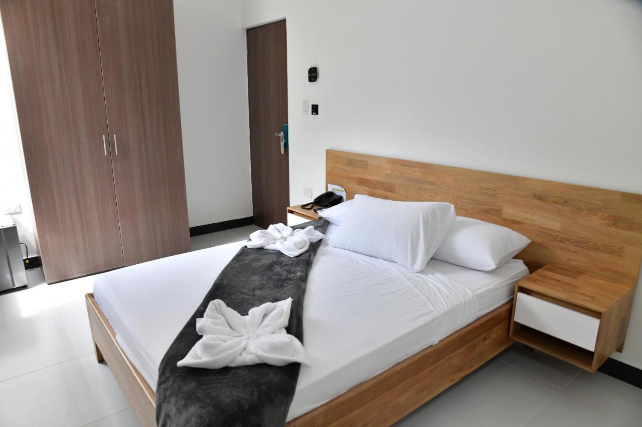 Alpha Hotel Boutique Necocli Bagian luar foto